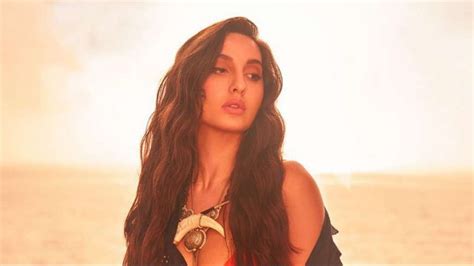 nora fatehi breast|Nora Fatehi flaunts her sexy curves in red hot bikini, shares jaw .